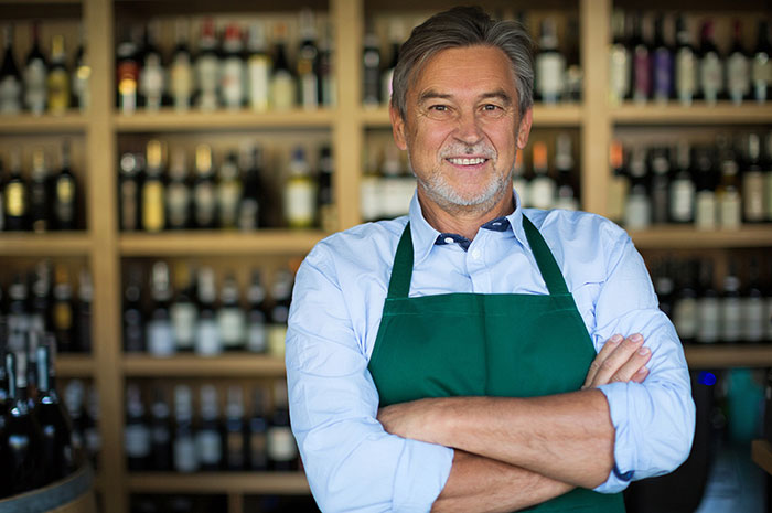 confident wine shop owner